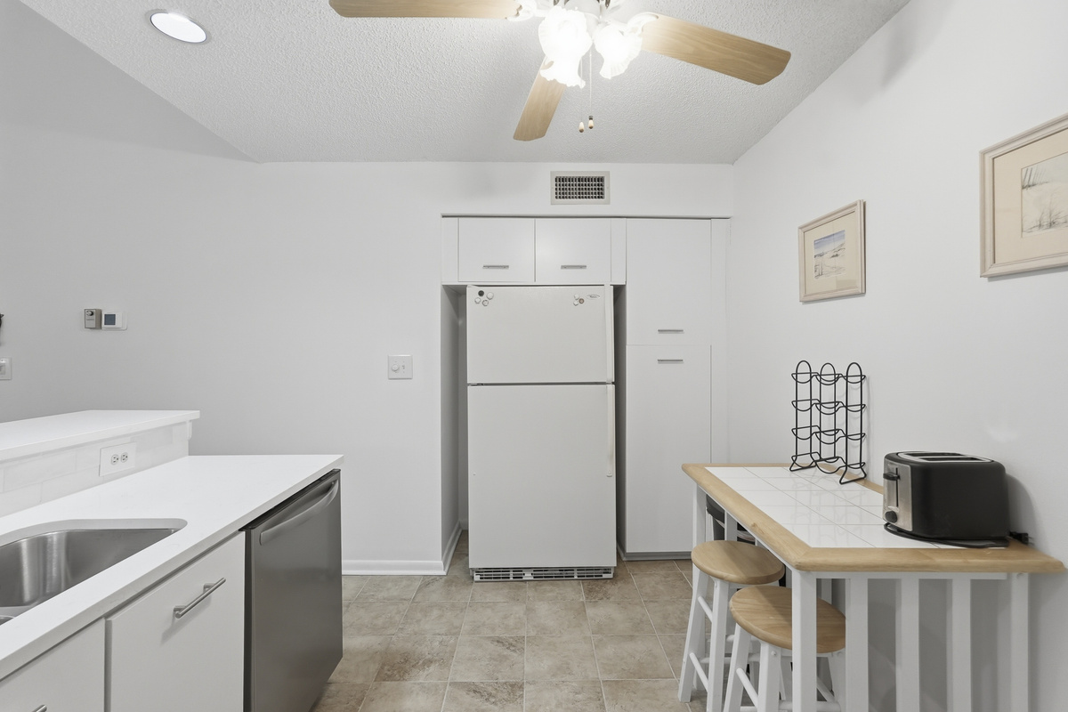 Fully equipped with modern appliances and essential cookware, the kitchen makes preparing meals easy, whether you're brewing your morning coffee or cooking a delicious meal for the group.
