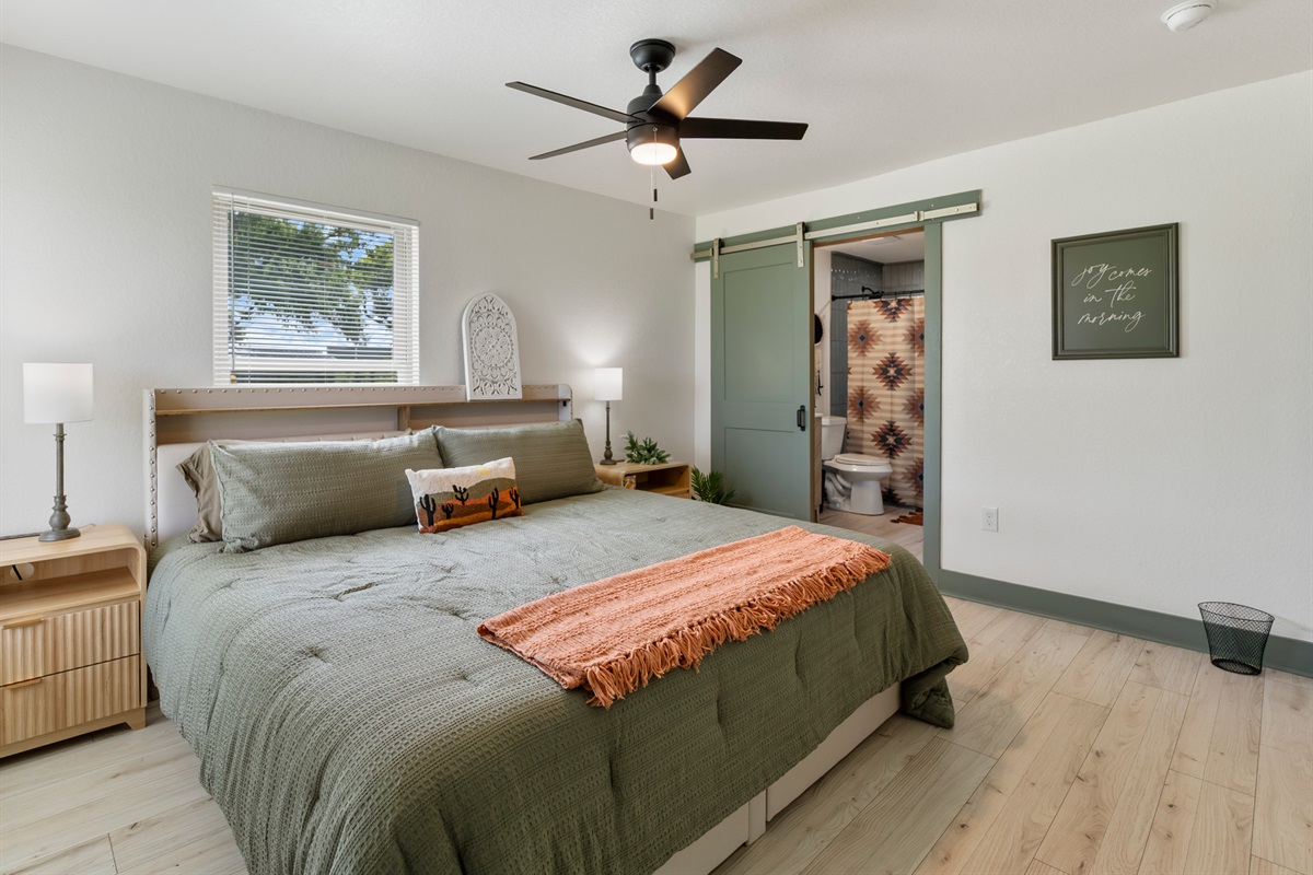 Primary Bedroom with a king size bed and ensuite bathroom