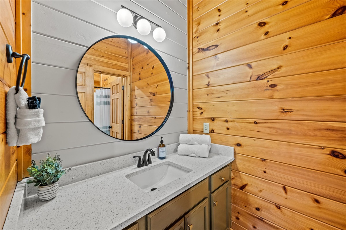 Bedroom 9 has a private bathroom with shower/tub