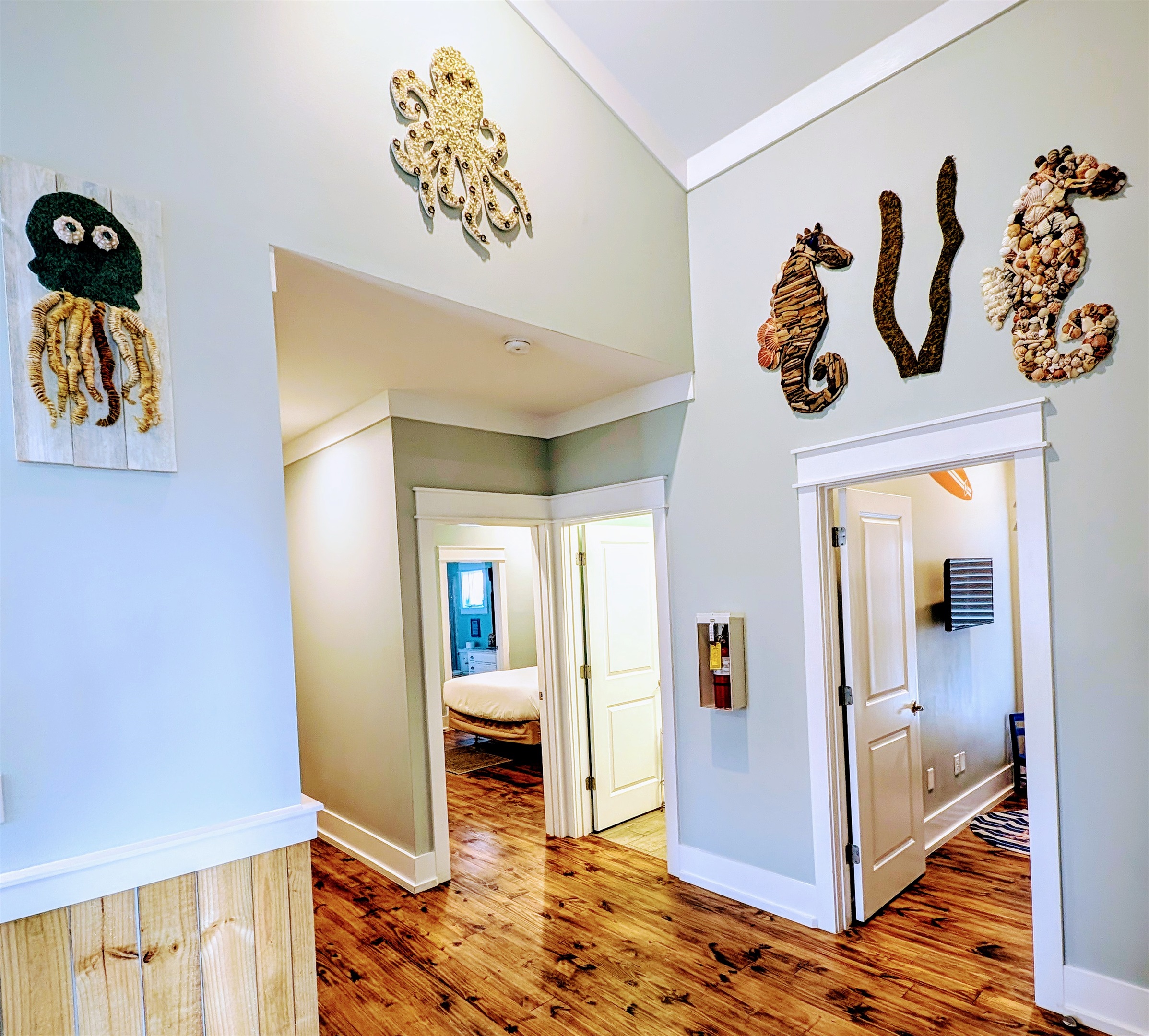 One of a kind decorations adorn the home, including an entire "aquarium" on the walls of the 3rd floor common area
