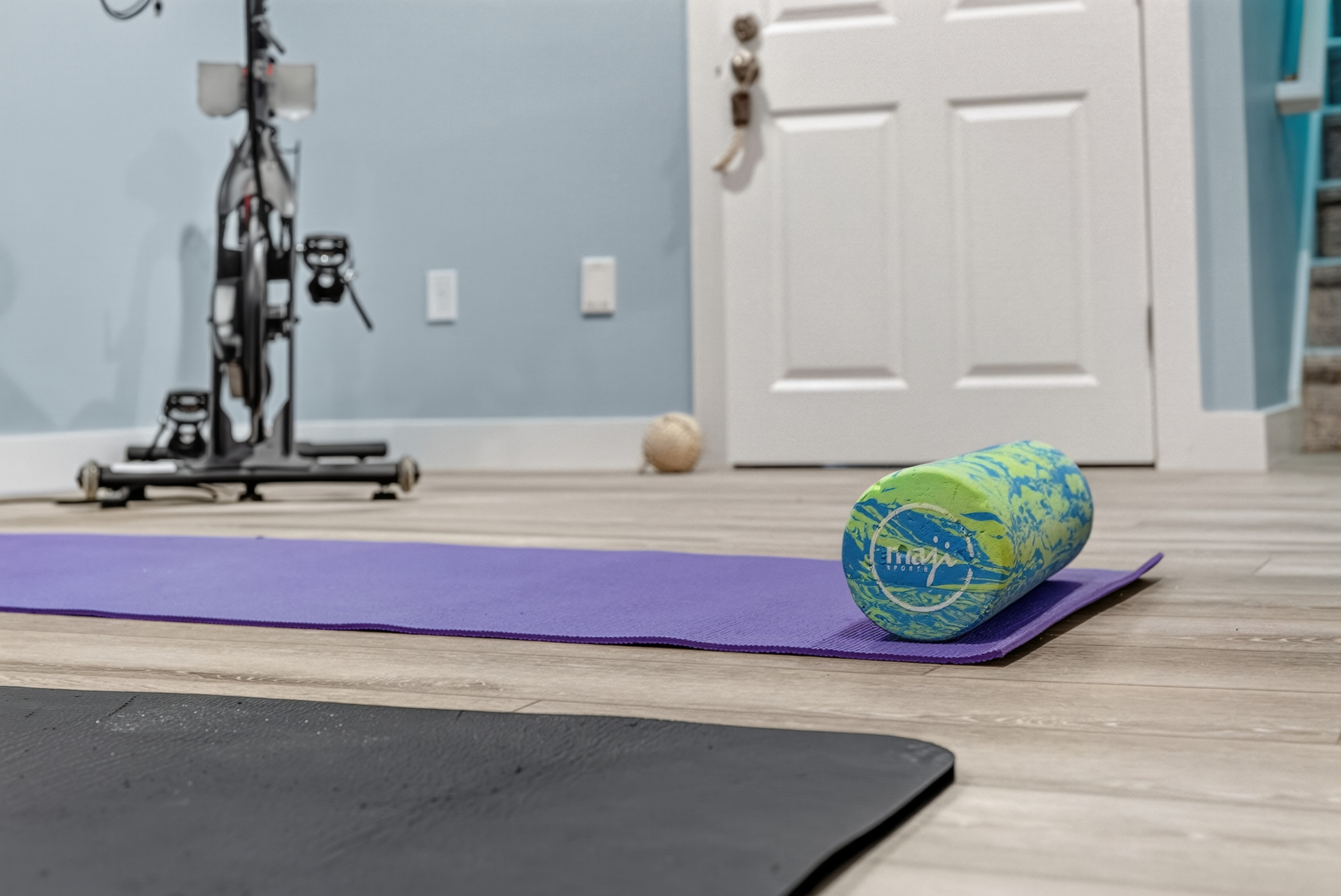 A convenient workout space equipped for stretching, yoga, or your daily fitness routine.