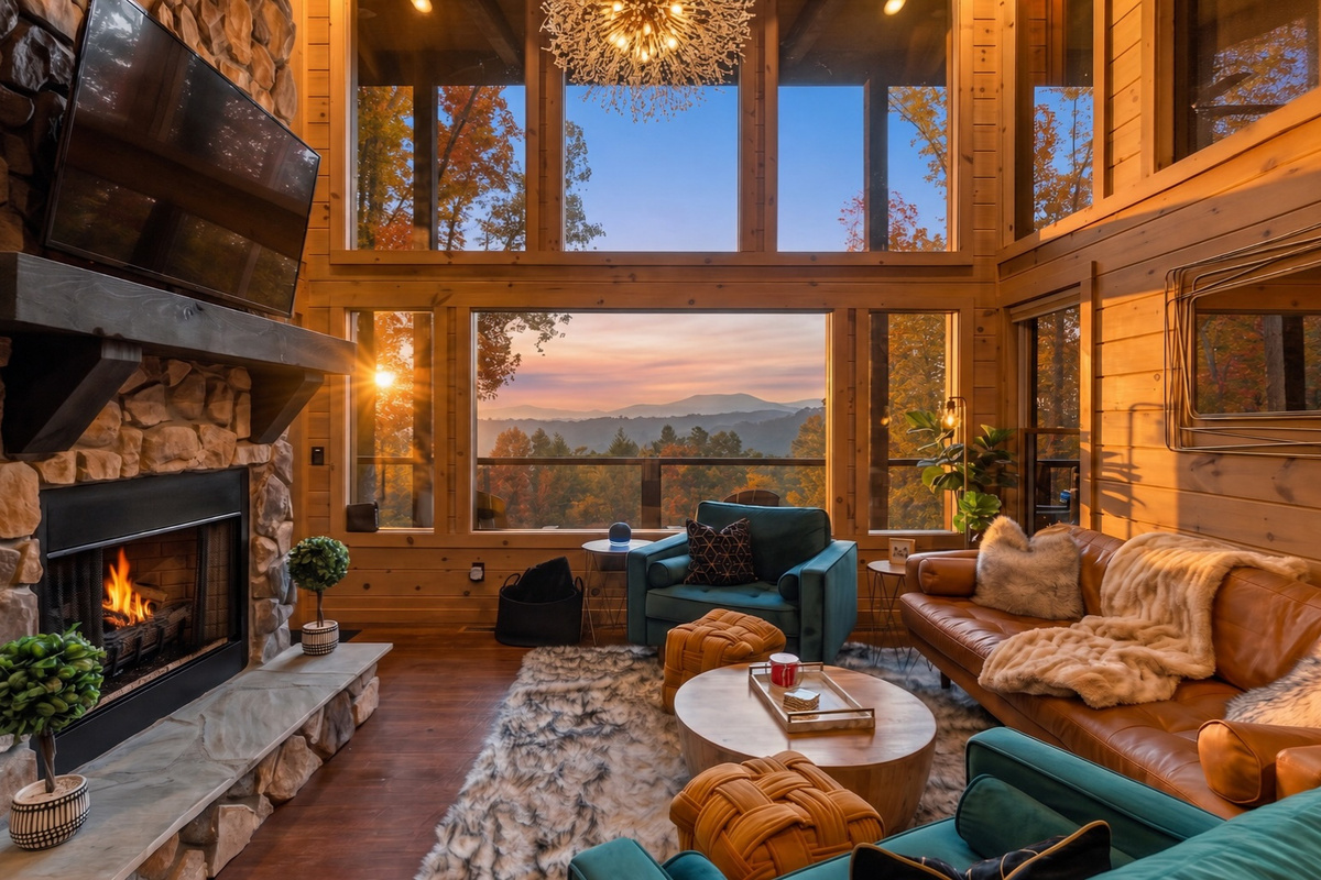 Modern mountain glam at Boujee Lodge, framed by panoramic mountain views.