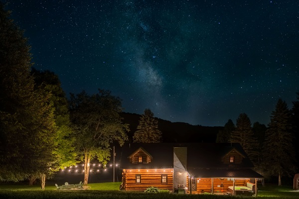 Unwind beneath the Milky Way. Our cozy back porch and covered hot tub offer the perfect retreat after a day of adventure. Soak, stargaze, and savor the serenity of our secluded mountain escape