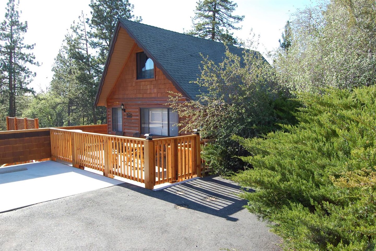 Patio: Fully-enclosed & pet-friendly 700 sq. ft. wraparound deck has gas grill, outdoor dining table, & hot tub. Perfect for sunsets, stargazing, and gorgeous views of Snow Summit & Bear Mountain! $60,000 upgraded private parking pad fits 4 cars.