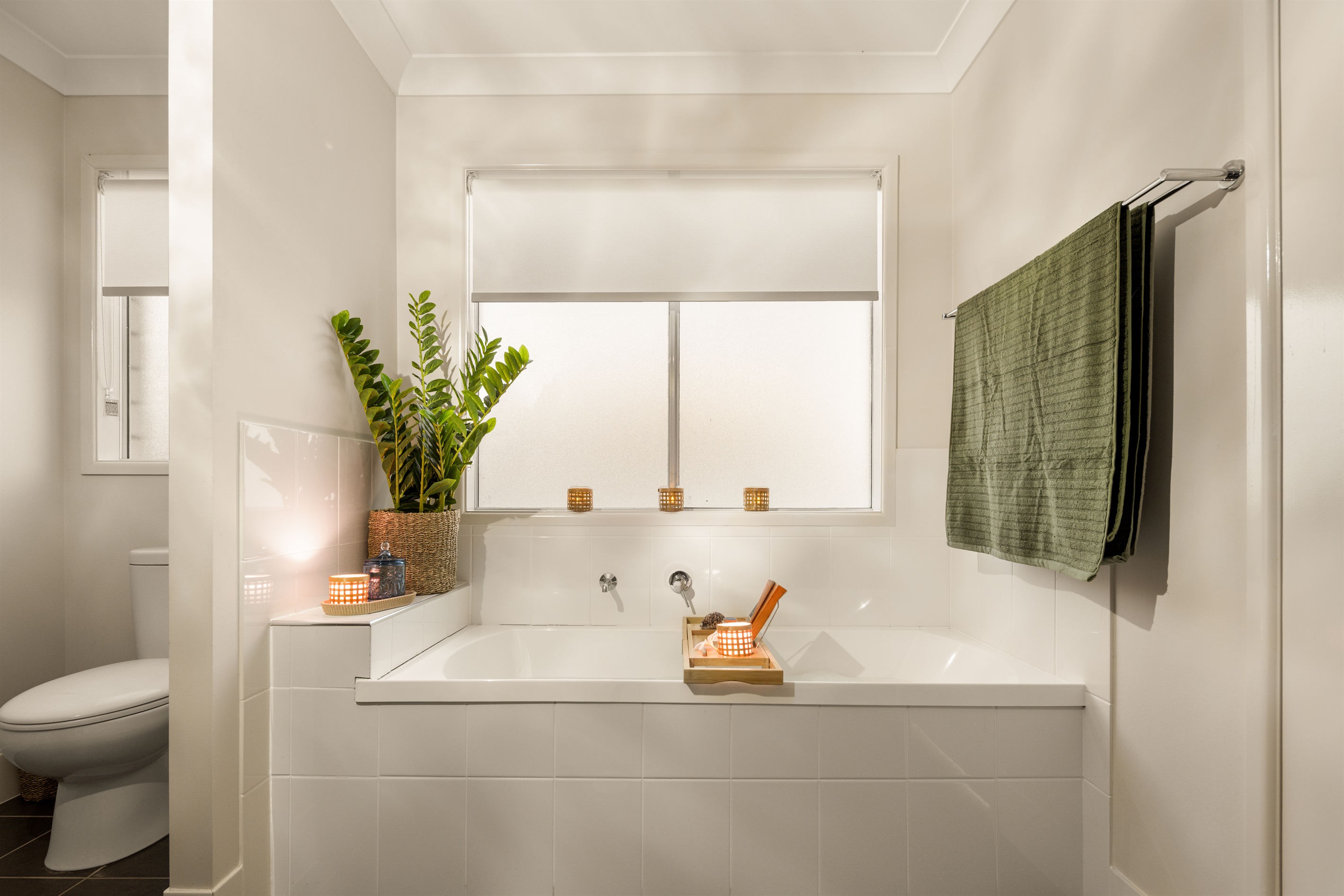 Relax in the spacious Master suite's private en-suite featuring a full-size bath
