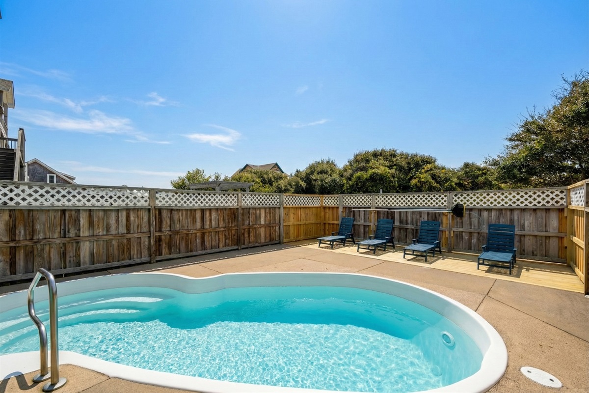 Lounge in the sun or cool off in the private pool.