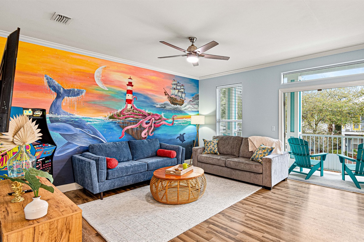 The living room mural sets the tone — welcome to paradise