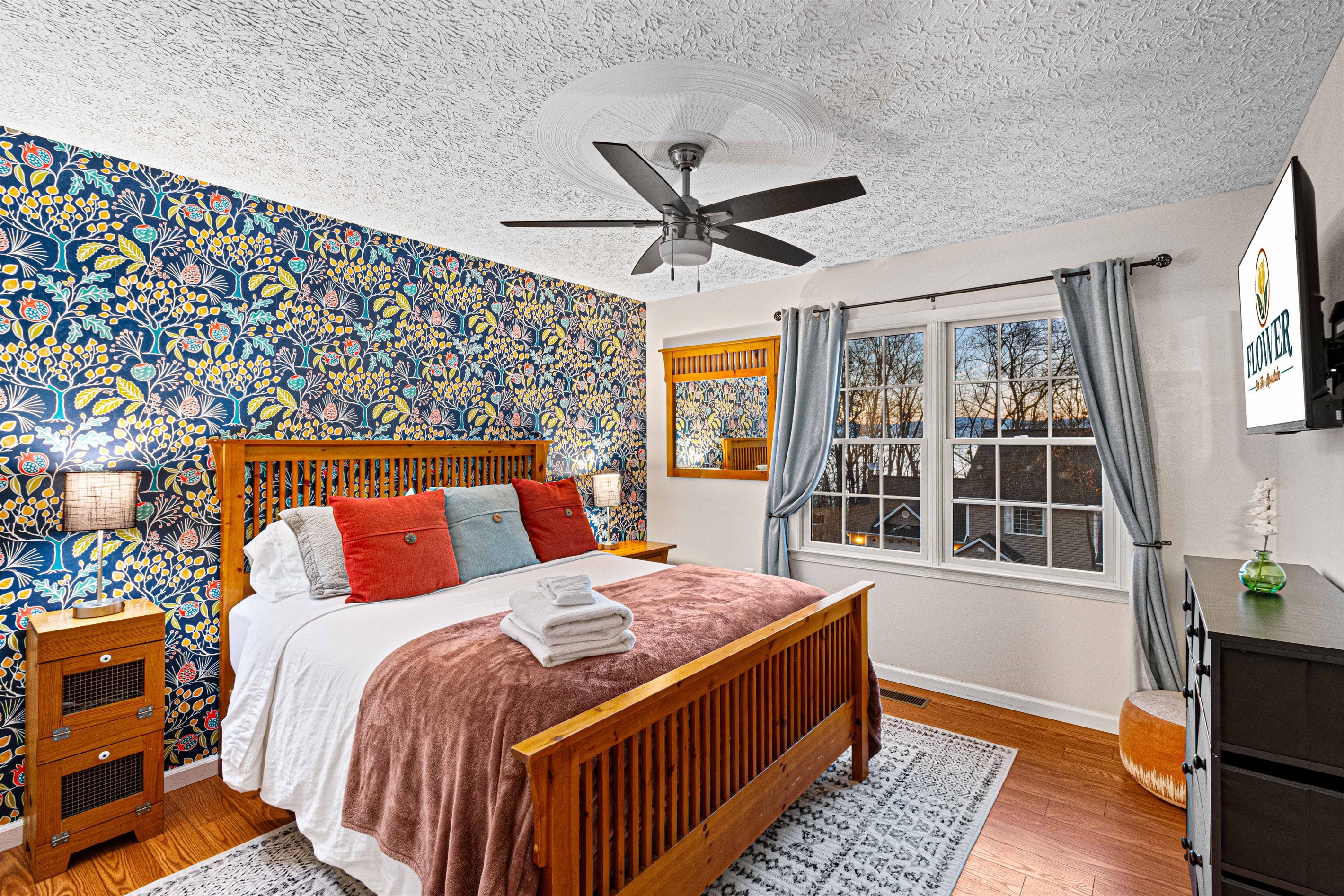 Queen bed with luxe pillow top mattress, bedding and "get ready" spot so ladies don't have to fight for bathroom time