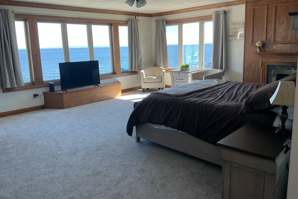Master bedroom with stunning Lake Winnebago views!