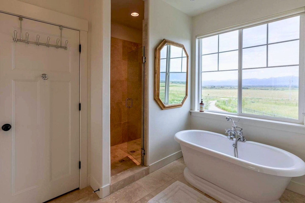 Luxurious ensuite bath with walk-in shower and soaking tub