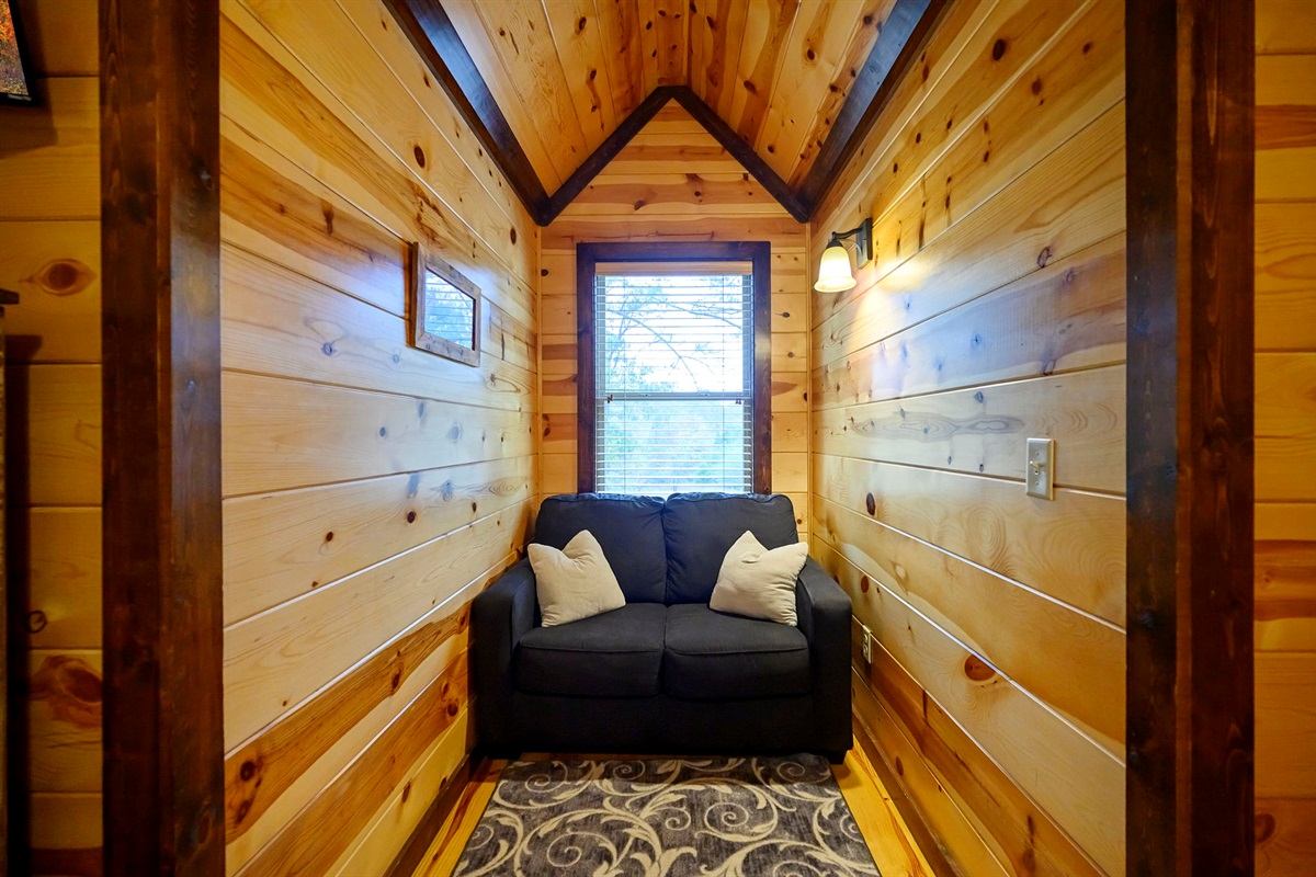 Cozy alcove nook with twin pull out bed.
