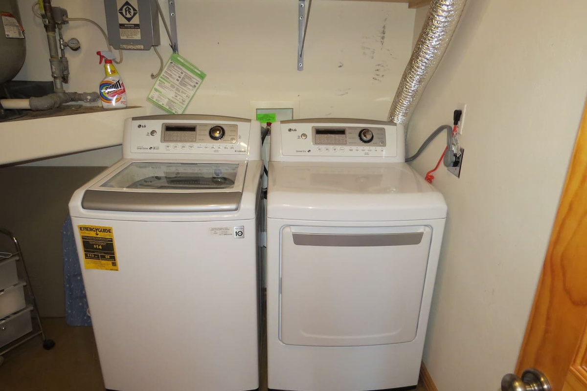 Utility room with washer and dryer.