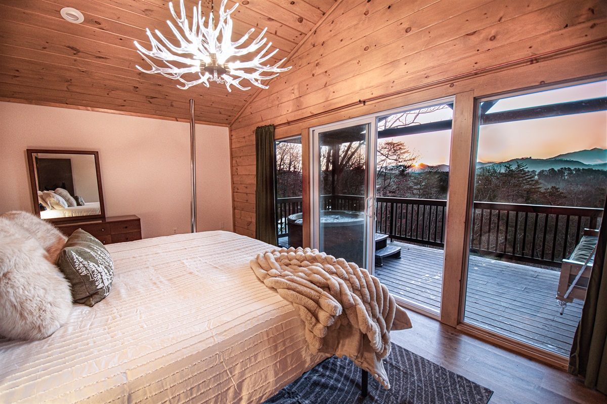 A wall of glass frames panoramic mountain views from bed.  Cozy up by the fire as the sun sets or enjoy our fun dancing pole... so much to do you'll never want to leave!