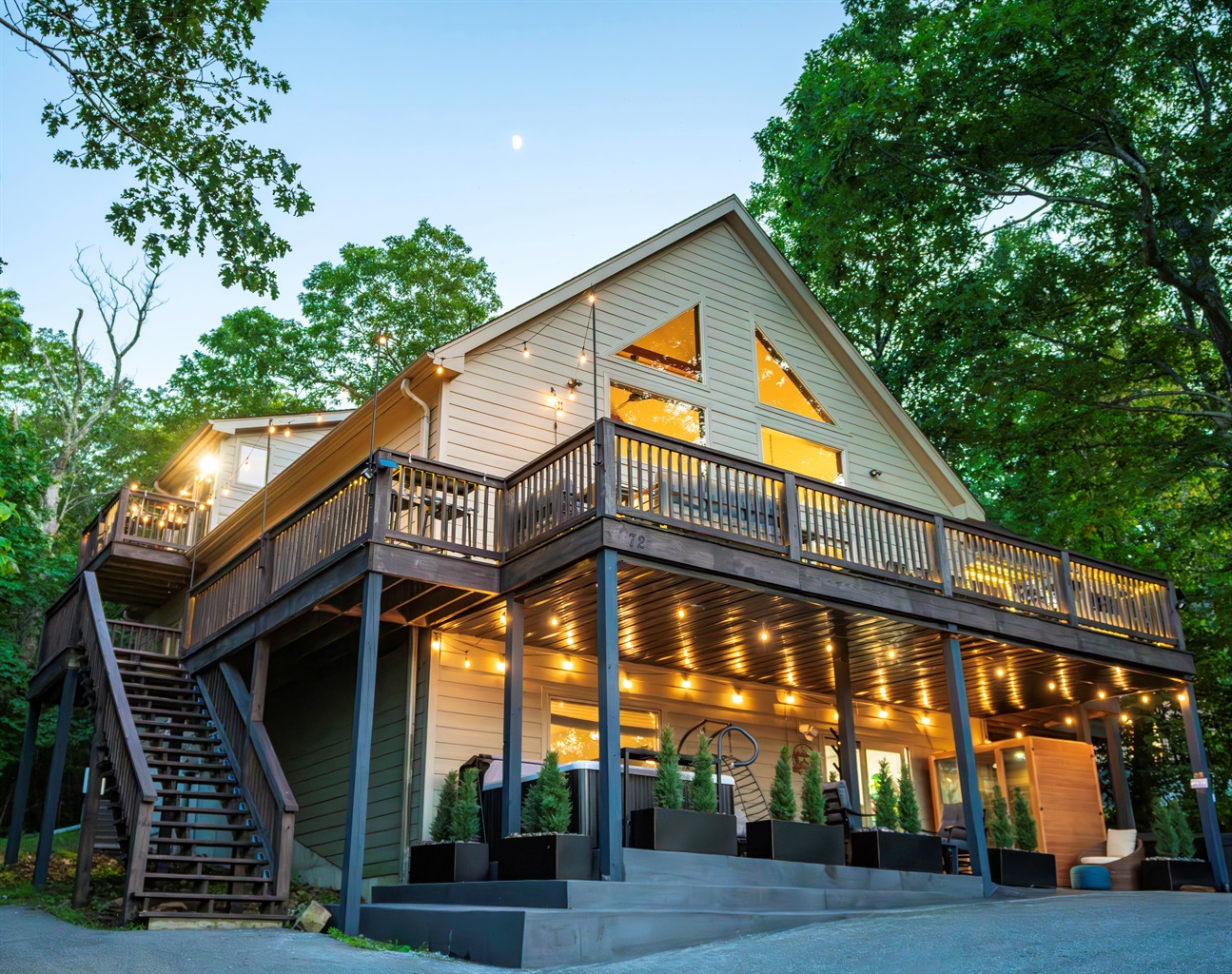 Architect-designed lines, elevated decks, and a glowing welcome — Chateau Greenstone stands apart before you even step inside