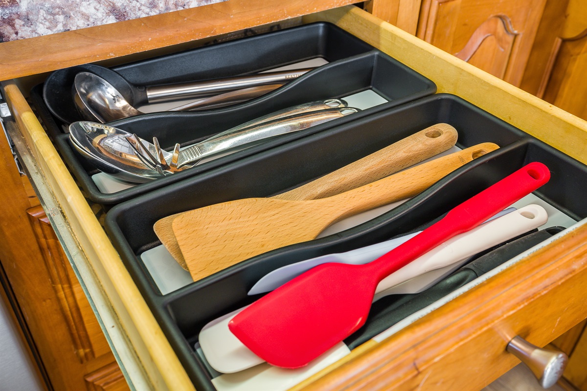 lots of spatulas, serving spoons etc