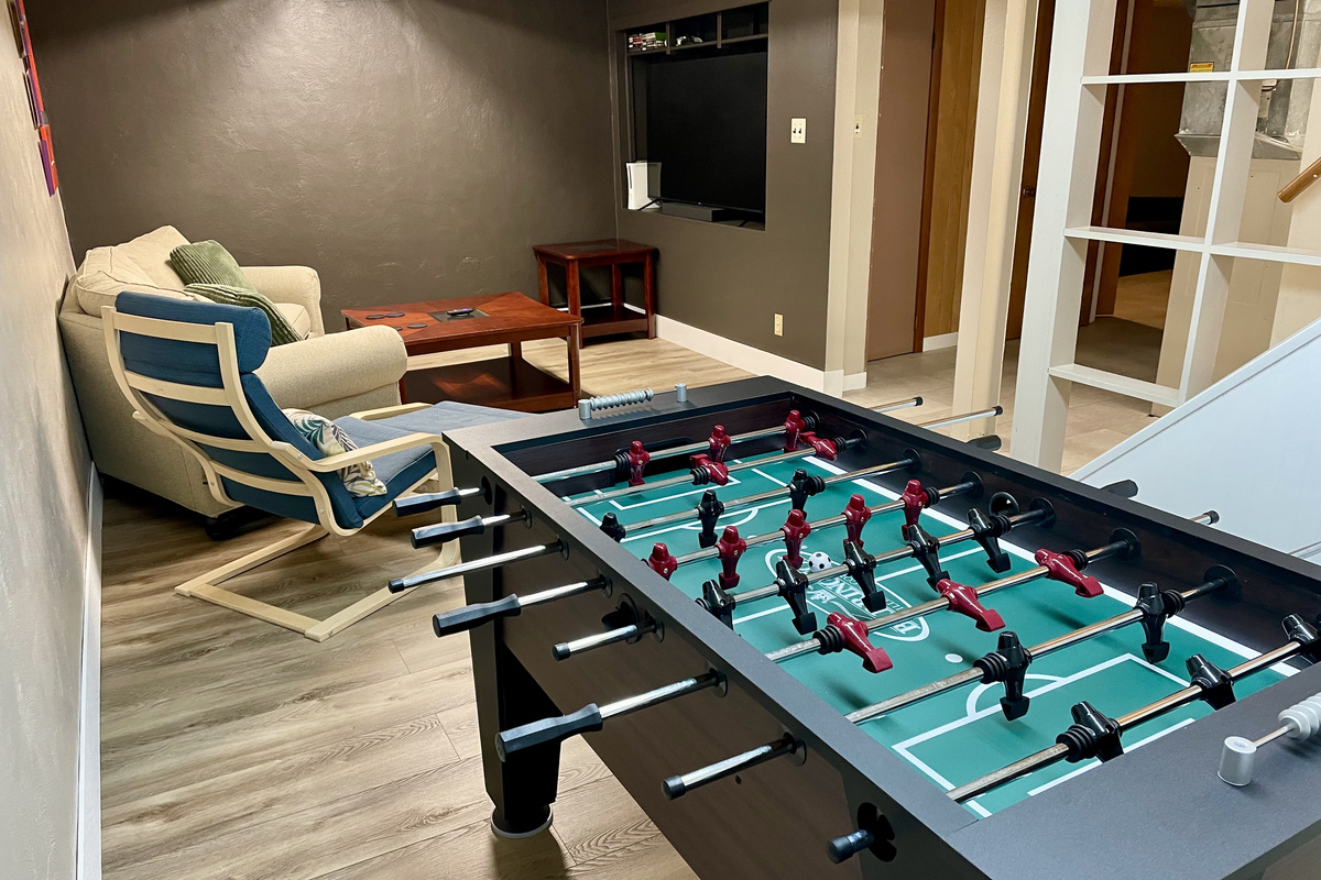 Lower level tv room with Xbox and games