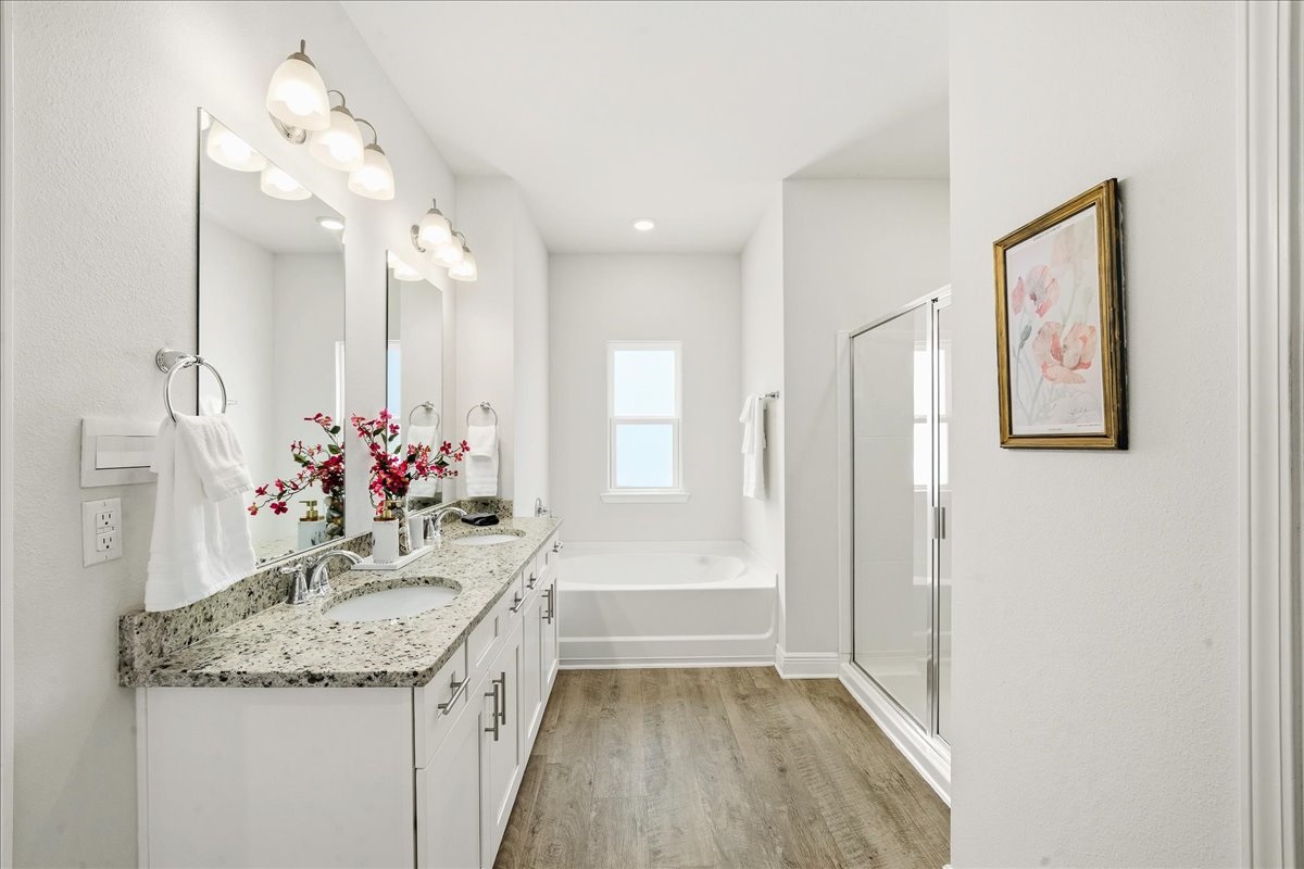 Primary bathroom: Dual sinks with Soaking tub and walk in shower

