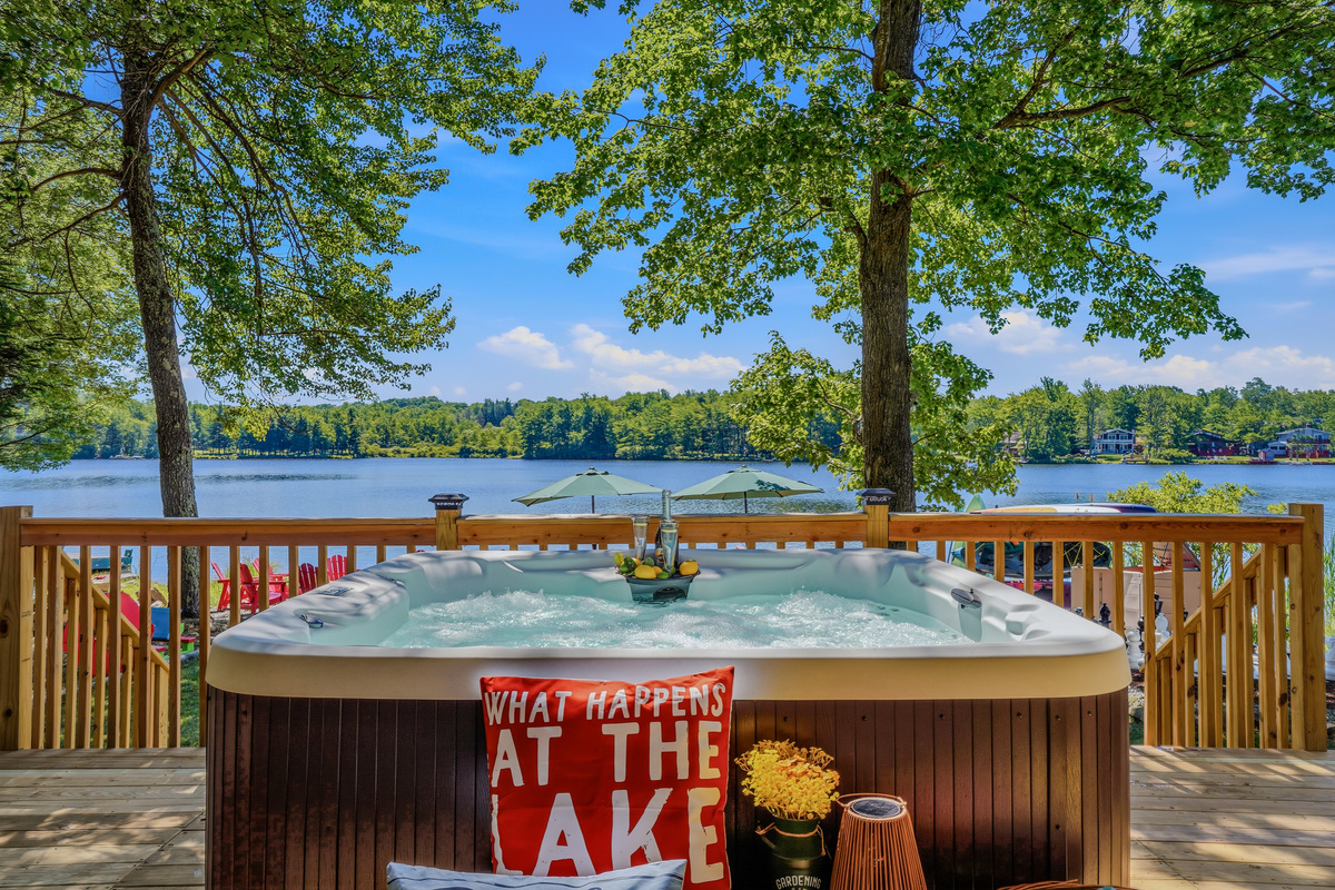 Hot tub on the lower deck with lake views