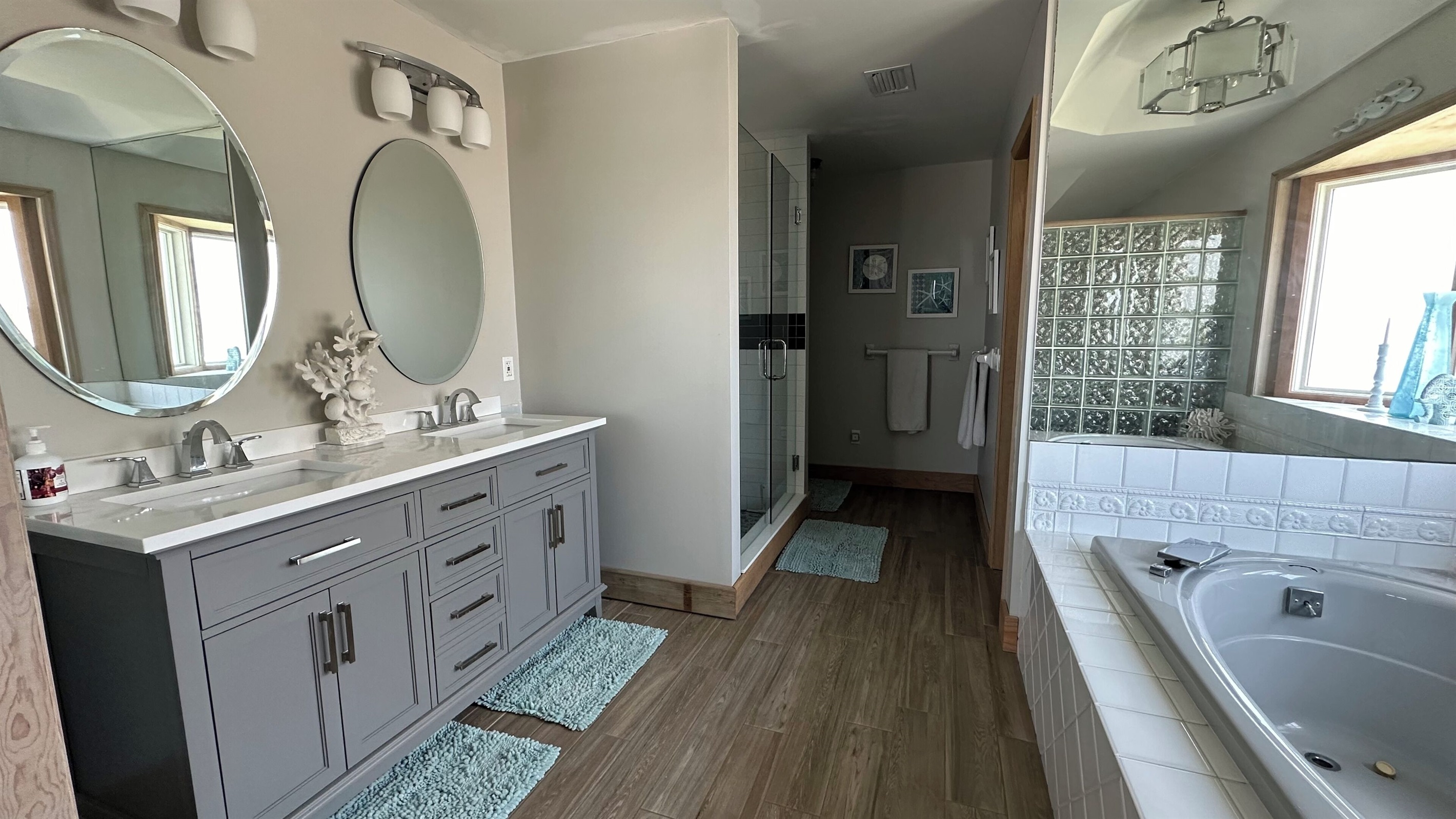 Main bedroom bath with garden tub and separate shower and double vanity