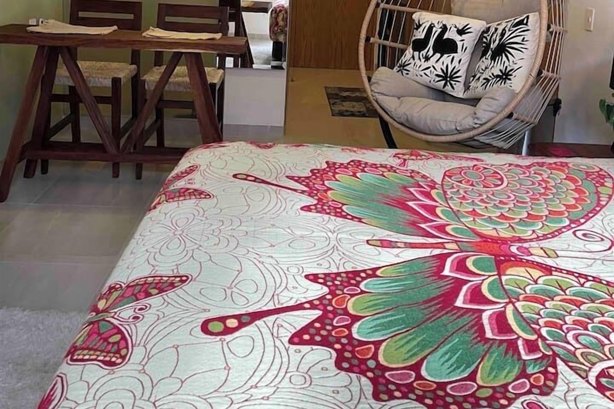 small studio with. queen size bed. there is a hanging basket chair so may be a little tight. if your ok with the layout you will have fun and relax for a short stay 322