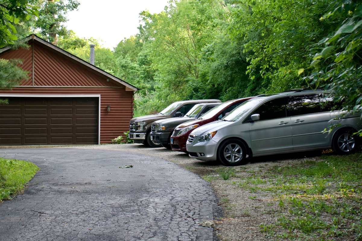 A fifth vehicle can park parallel to the driveway in the area next to the van in the picture. There is no street parking and for safety reasons we ask guests not to block the driveway.