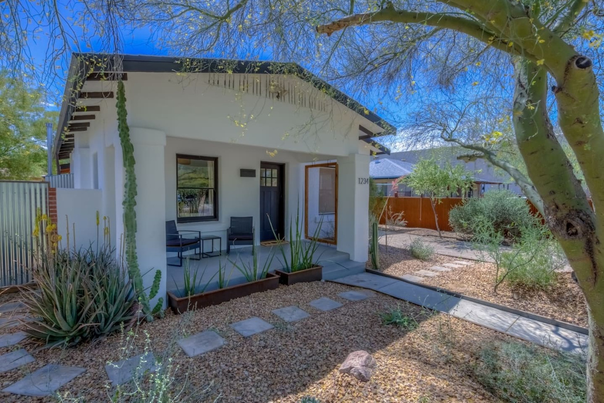front porch looking at mature desert landscaping