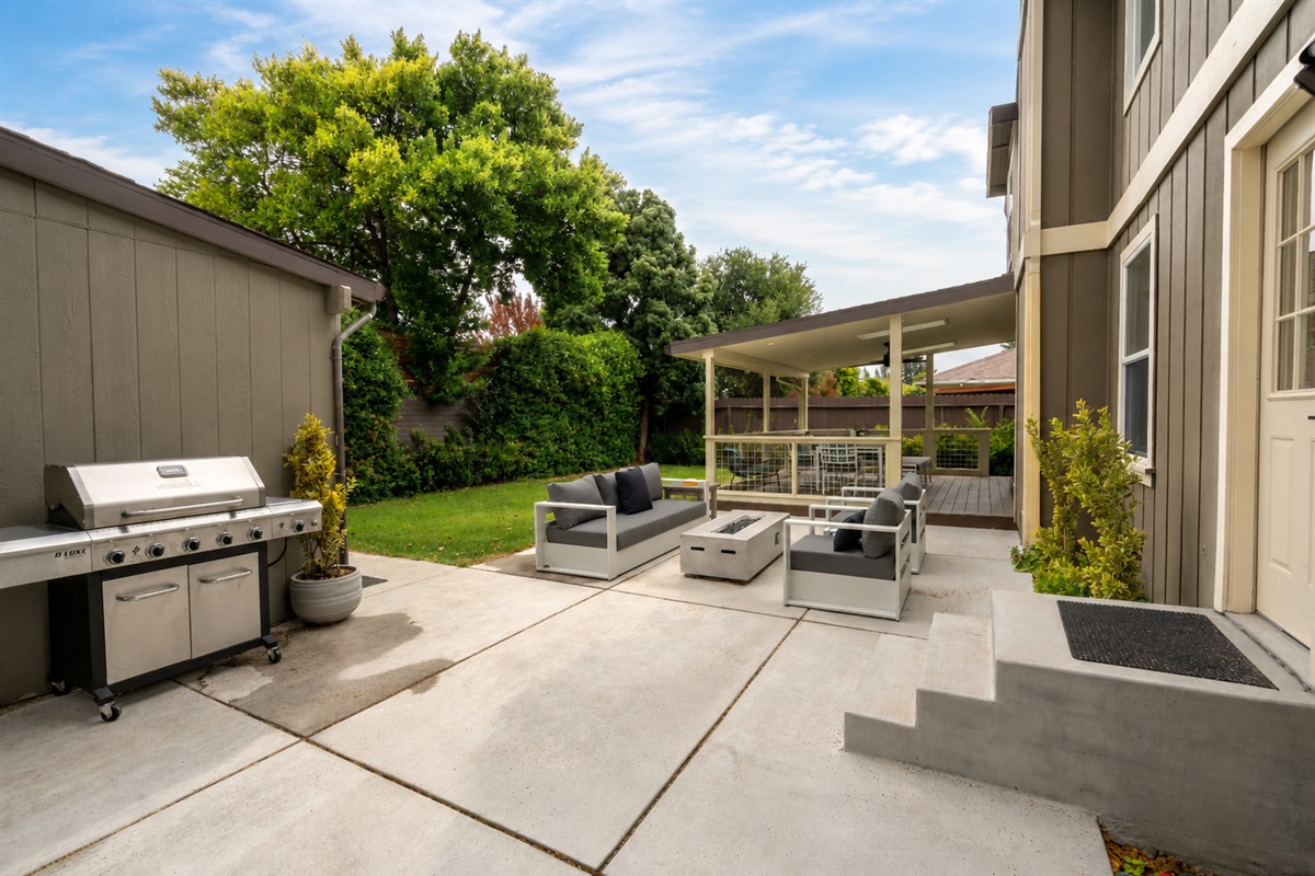 Outdoor seating for 5 with fire pit and BBQ grill
