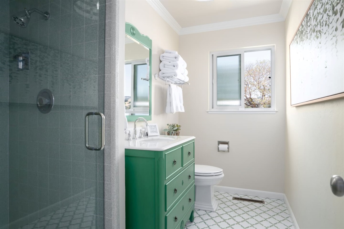 Refresh and rejuvenate in our stylish bathroom with a sleek shower.