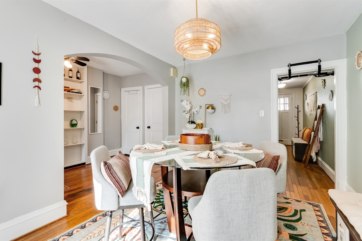 Dining Room: Enjoy meals under a stylish pendant light, surrounded by vibrant decor and warmth!