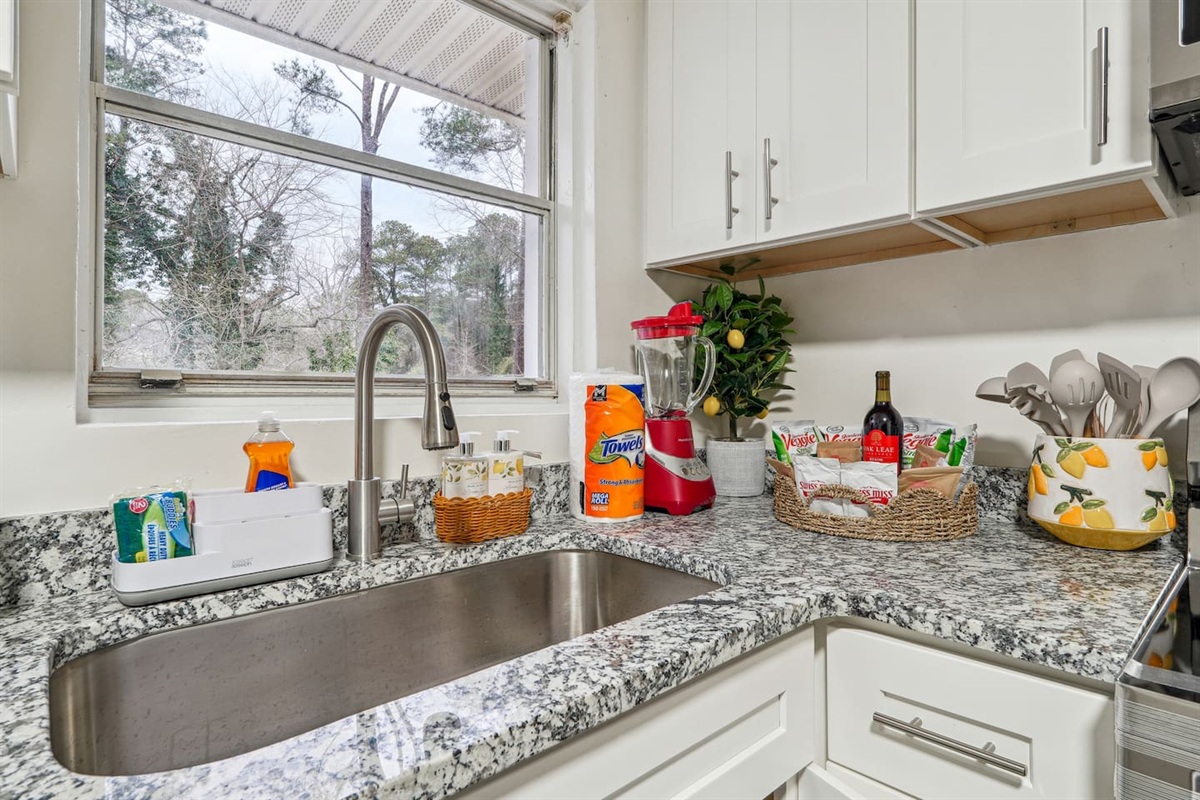 Enjoy a fully equipped kitchen featuring a dishwasher, oven, stove, microwave, sink, toaster, and coffee maker. It also comes stocked with glasses, cooking utensils, pots, pans, spoons, forks, and everything you need to prepare your favorite meals.
