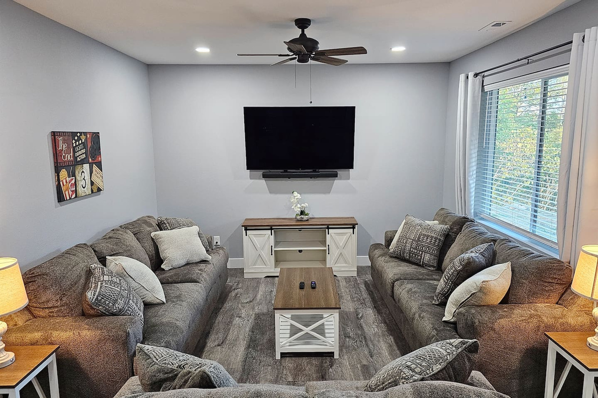 Downstairs second living area with surround sound to enjoy your moving watching.