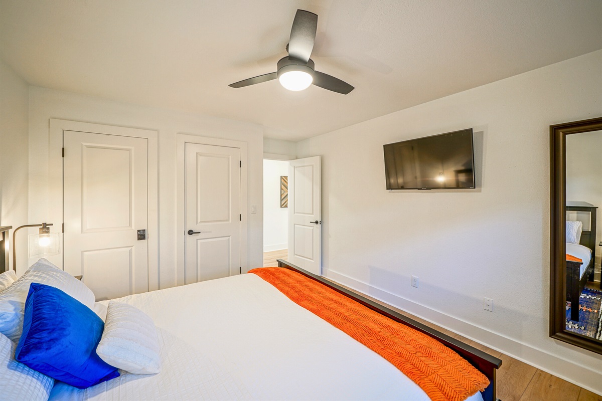 Wind down with a favorite show or tuck into a good book — this king suite has all the comforts of home with a luxury twist.