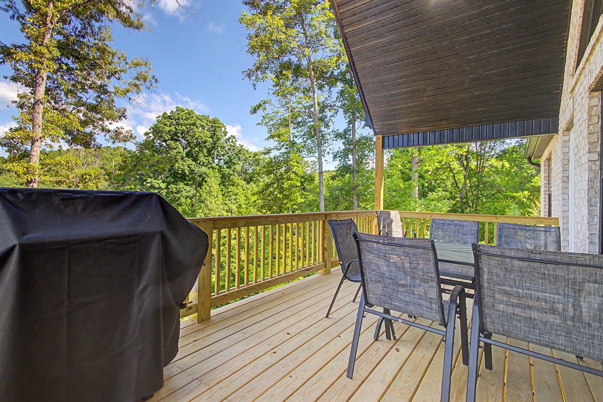 Main level deck. Dining and grill