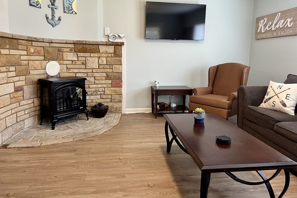 Electric fireplace and smart tv in living area