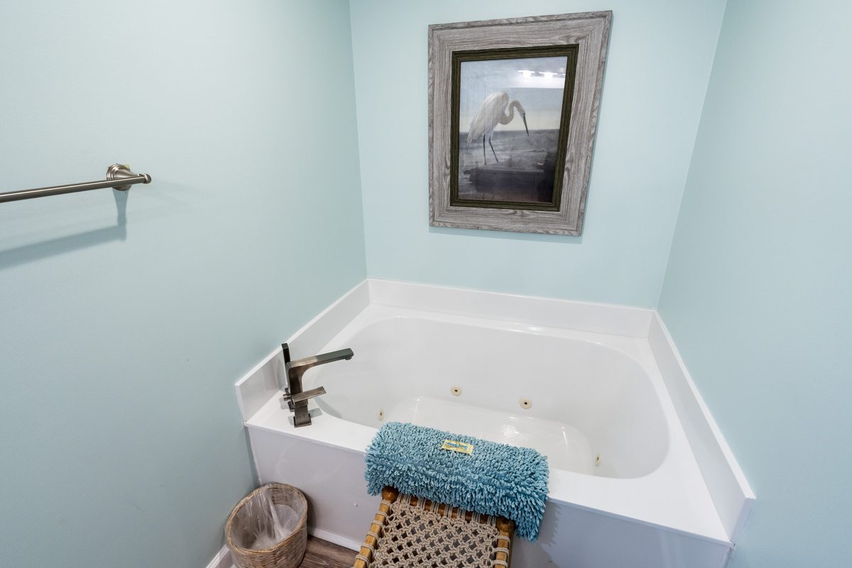 Jetted tub in the updated primary bathroom.