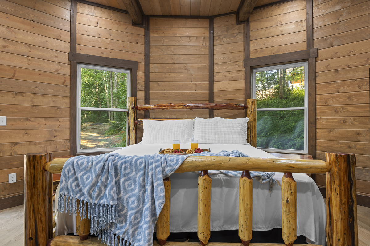 Rustic Retreat: Experience nature views from this charming, wood-paneled sanctuary!
