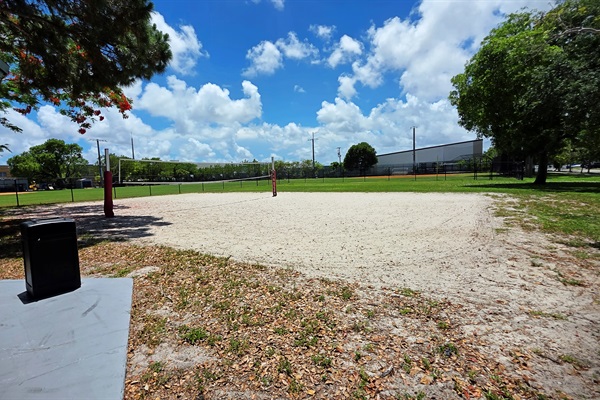 Residents enjoy direct access to Floranada Park, featuring sand volleyball courts, baseball fields, picnic pavilions, open green spaces, and recreational amenities in Fort Lauderdale, Florida.