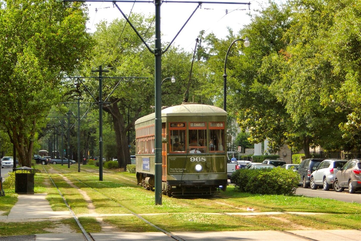 Take the street car down historic St Charles Ave to visit the French Quarter.