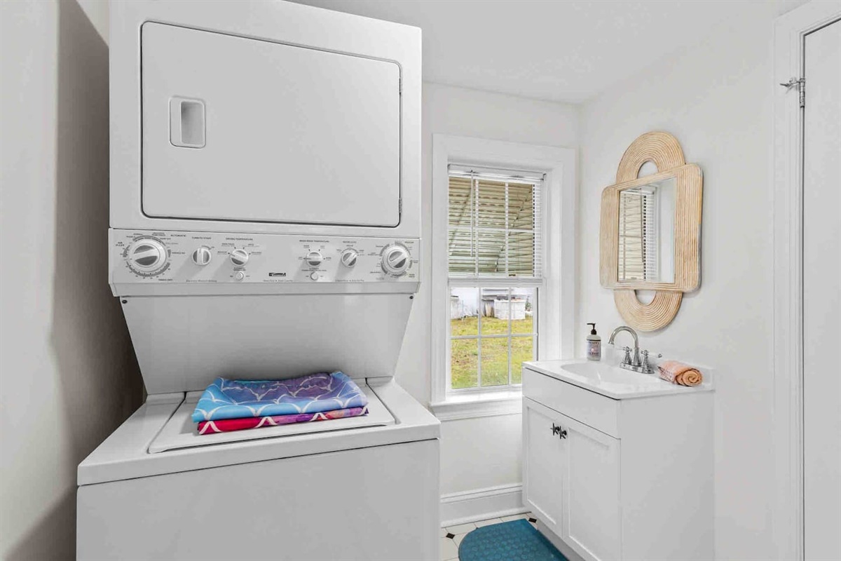 Laundry and half bath directly next to the full bathroom. 