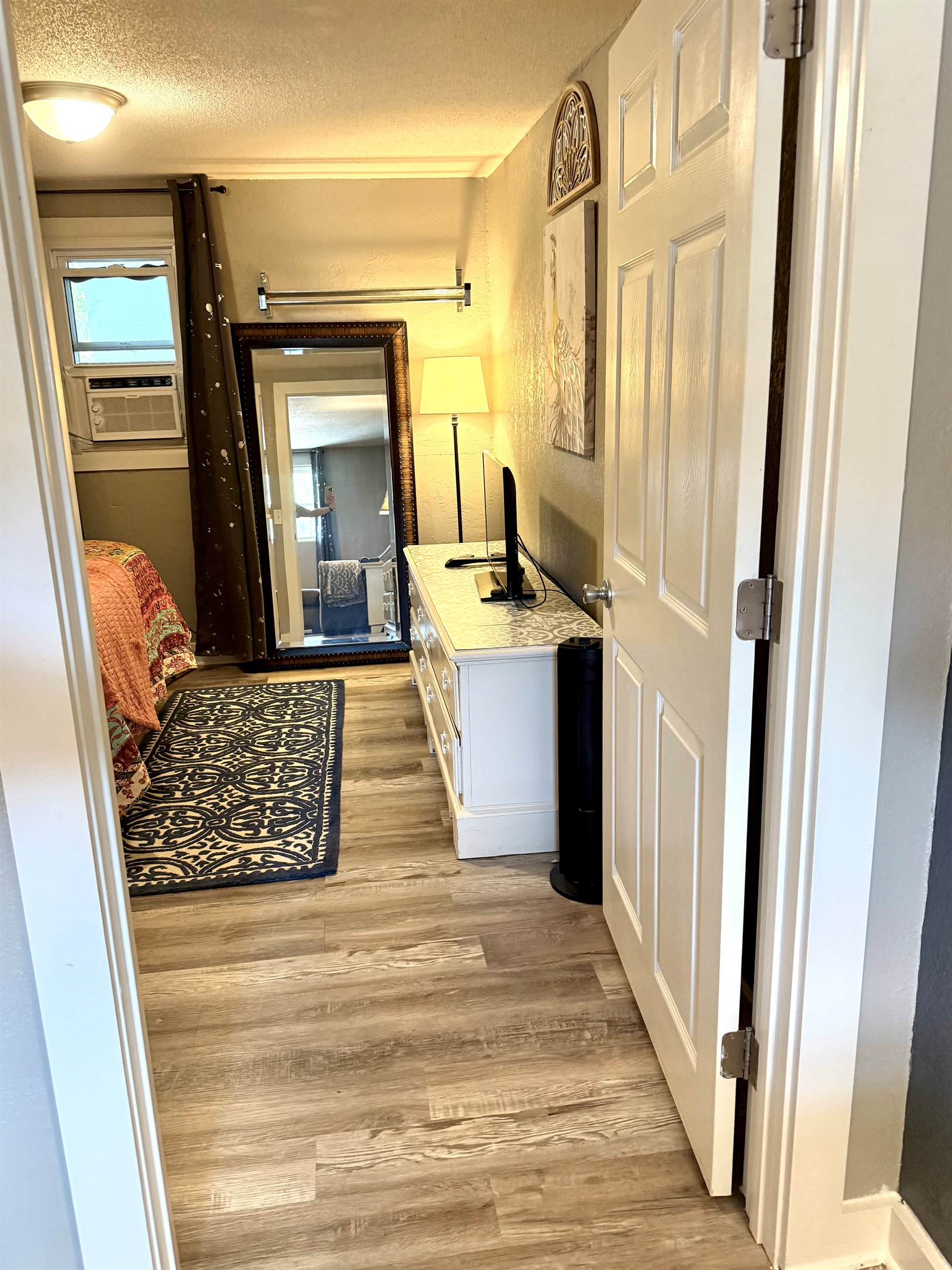 Door walking into queen bedroom.