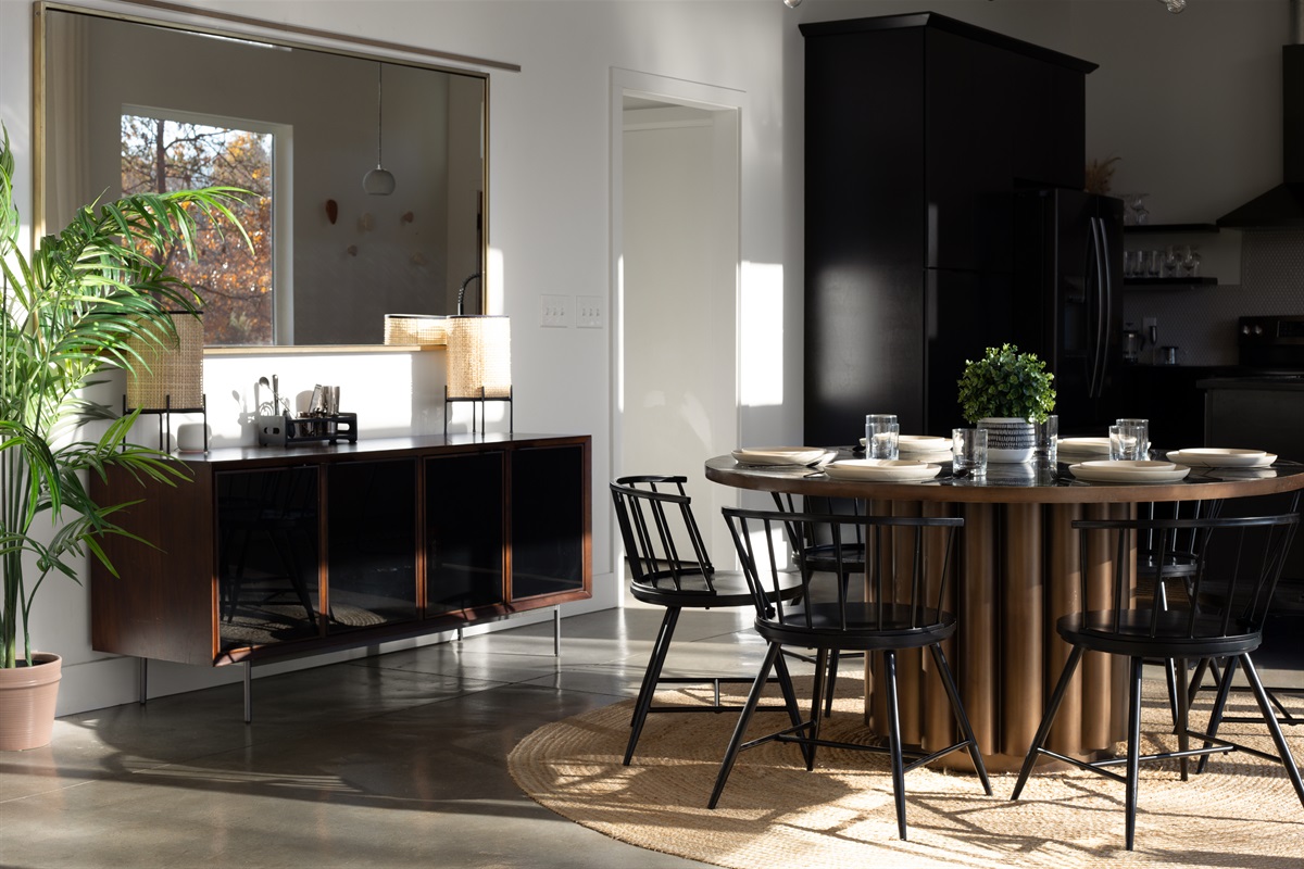 {Dining} Elegant dining moments—beautiful place settings, warm light, and a pour of Biltmore wine.