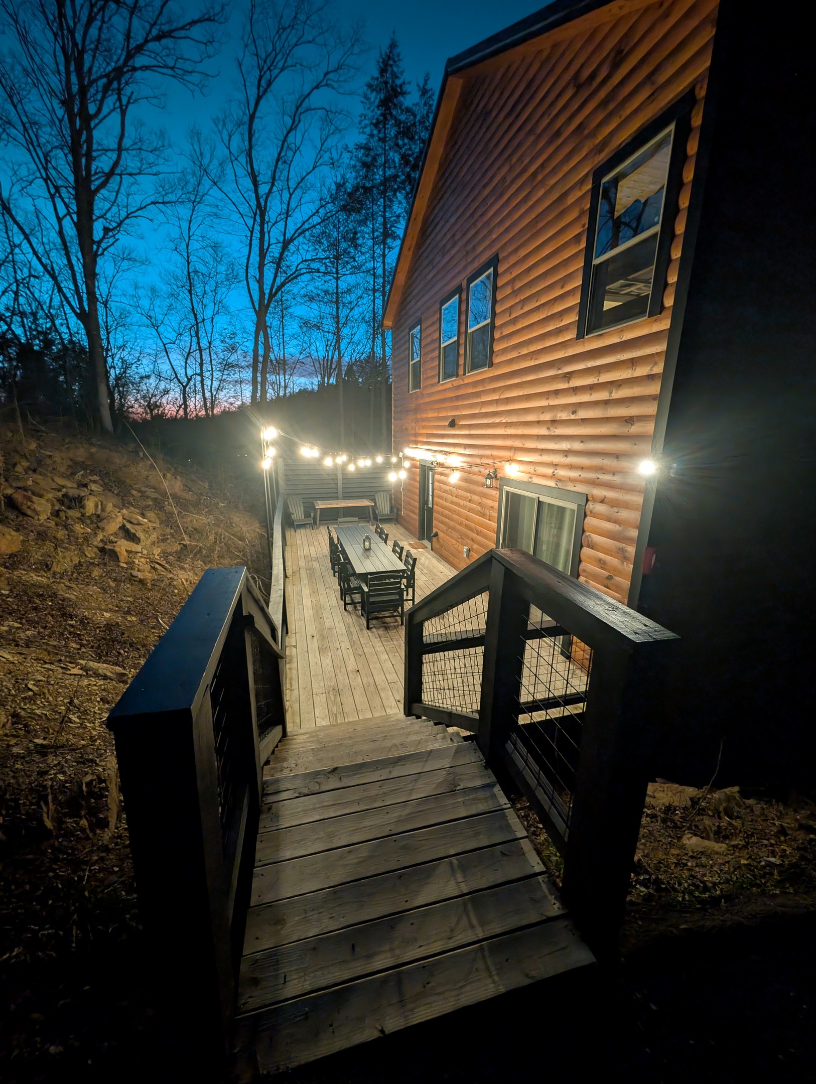 Create lasting memories with outdoor dinner parties on the deck, surrounded by professional landscaping and warm patio lighting.