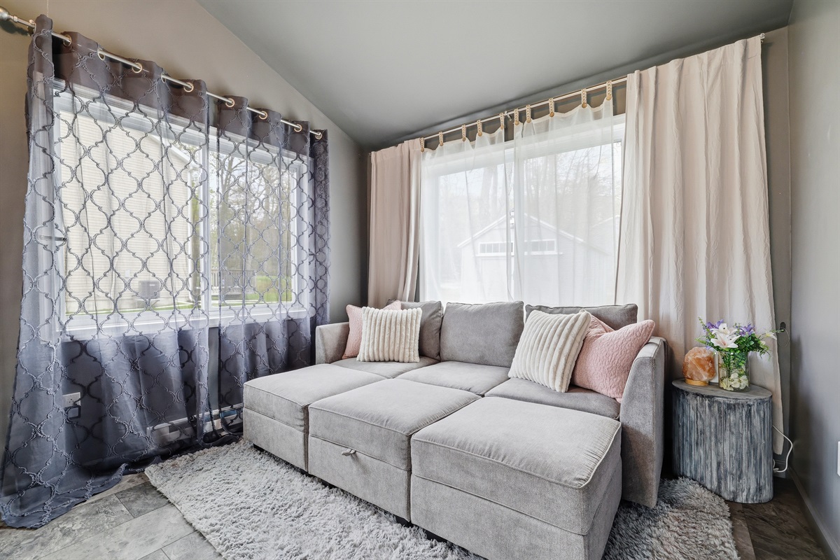 Big couch perfect for hanging out, snuggling, and even taking a nap! 