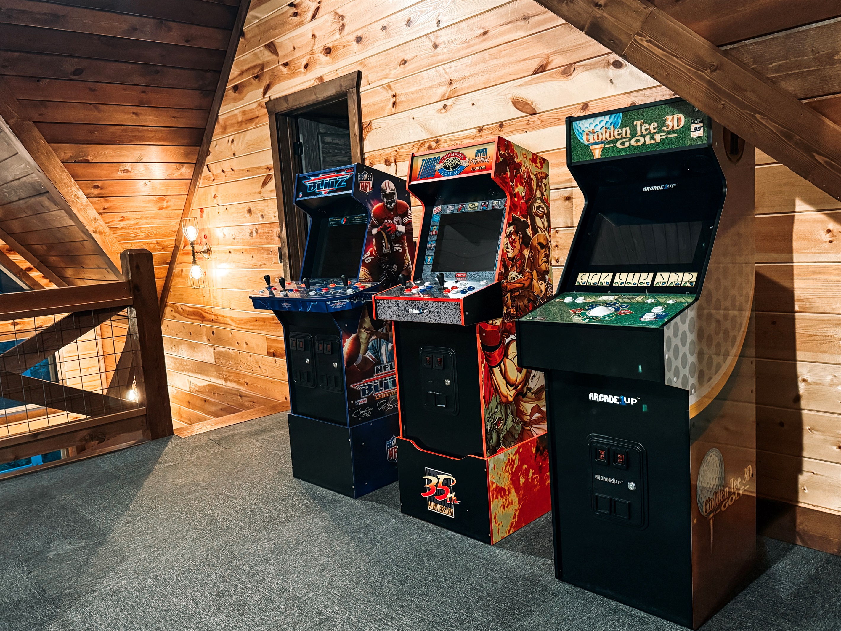 Level up family fun in the loft game room with 5 arcade machines and foosball.