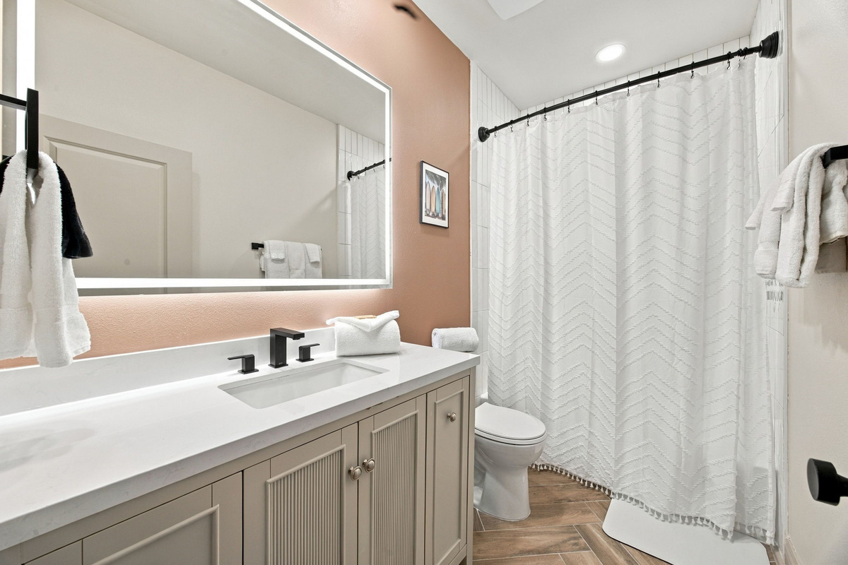 Freshen up surrounded by bright, polished finishes.