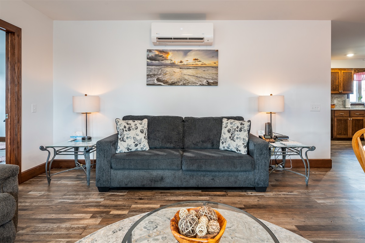 Bright, inviting lounge with modern décor and comfortable seating for family movie nights.