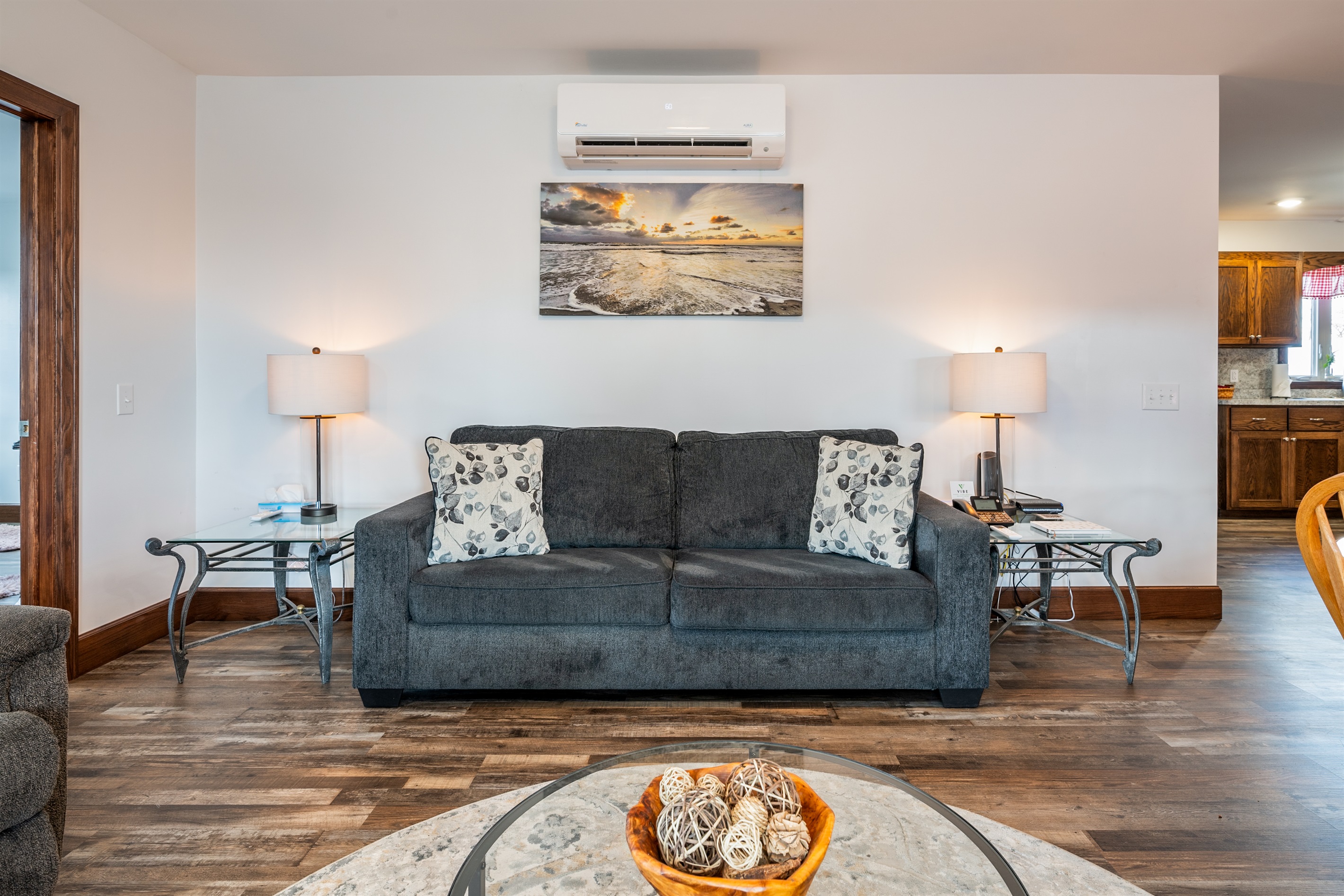 Bright, inviting lounge with modern décor and comfortable seating for family movie nights.