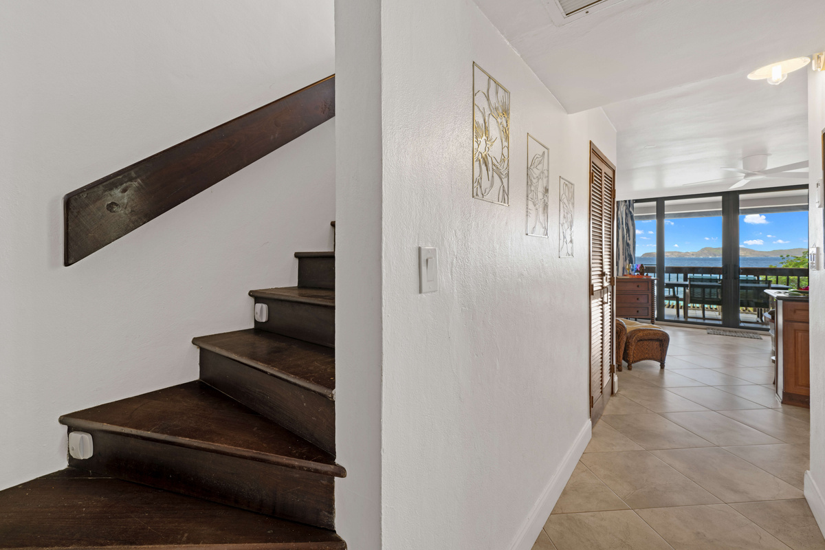 Head upstairs to the private primary suite and additional living space.
