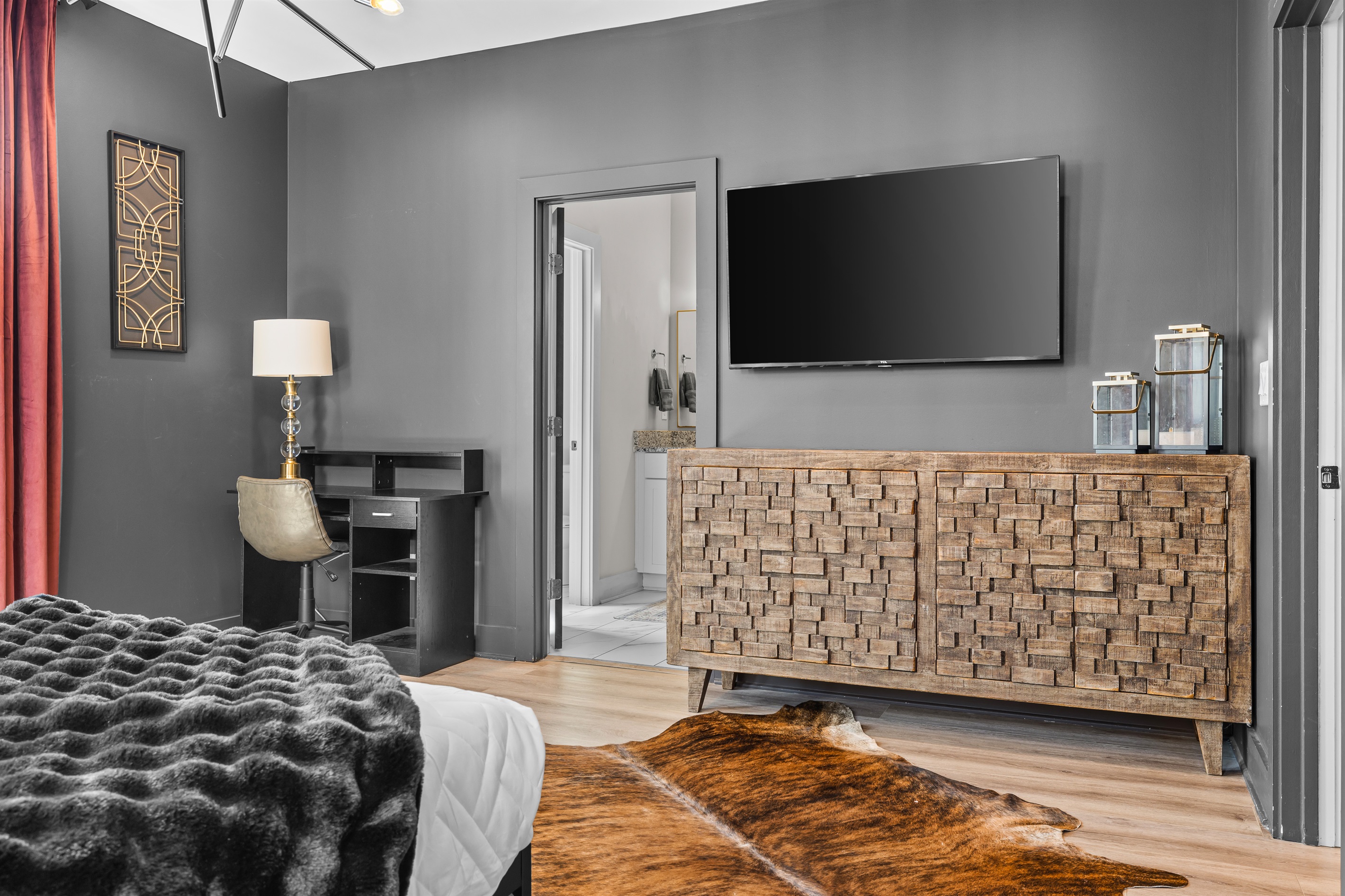 Bedroom Oasis: Relax in stylish surroundings with plush bedding and modern decor!