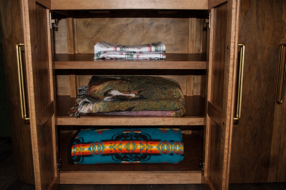 Extra blankets and bedding.